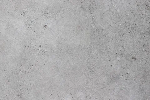 Concrete gray texture with small dots and cracks Stock Photos