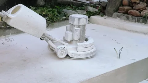 Concrete grinder machine on outdoor cafe patio. Under construction renovation Stock Footage 343042598