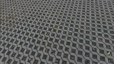 Concrete interlocking paving tile driveway parking place street texture Stock Footage 154003459