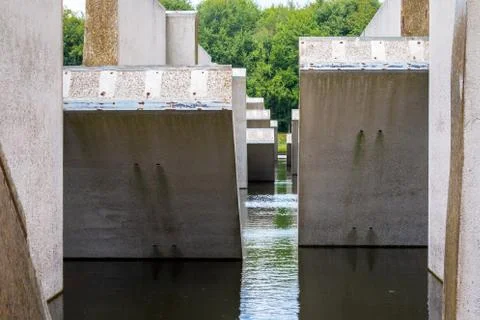 Concrete lab testing device in the middle of a artificial lake Stock Photos