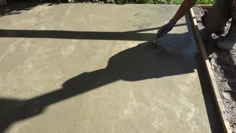 Concrete leveling with hand tool for gazebo foundation Video stock 293711749