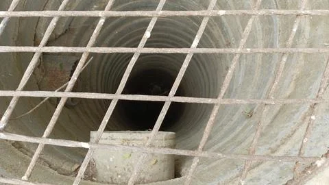 Concrete manhole drain pit grid top view close up stock photo image Stock Photos