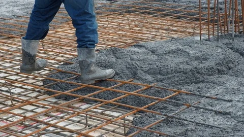 Concrete mix poured into framework Stock Footage 102343721