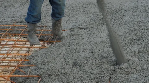 Concrete mix poured into framework Stock Footage 102343738