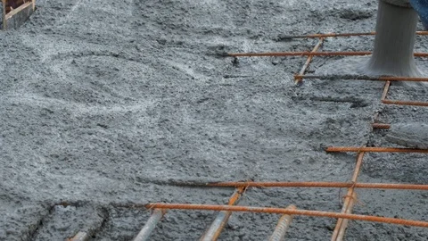 Concrete mix poured into framework Stock Footage 102343743