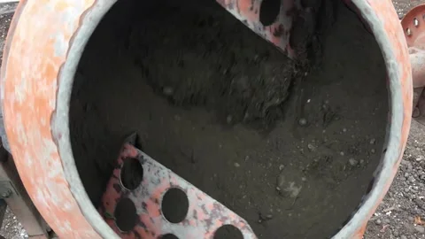 The concrete mixer interferes with the dry mixture Video stock 165256445