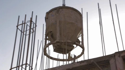 Concrete mixer lifting crane. Construction crane lifts the concrete mixer over 動画素材 110771444