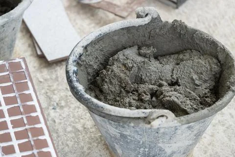 Concrete mixing process construction site industrial environment close-up v.. Stock Photos