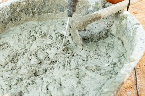 Concrete mixing process essential steps for construction projects in a work.. 库存照片