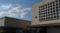 Concrete Office Building And Clouds In The Sky Ultra HD Time Lapse 4k or 4k+ Resolution