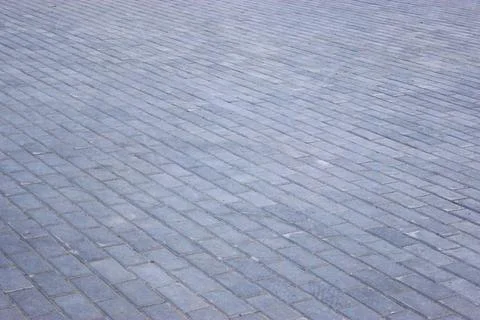 Concrete or cobble gray square pavement slabs or stones for floor, wall or path Stock Photos