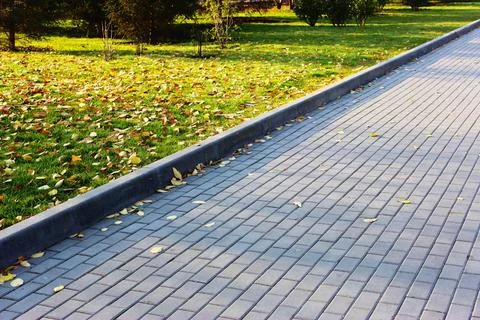 Concrete or cobble gray square pavement slabs or stones for floor, wall or path Stock Photos