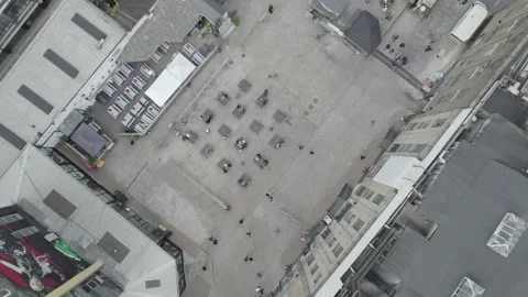 Concrete or paved small square between buildings in town Video stock 167963271