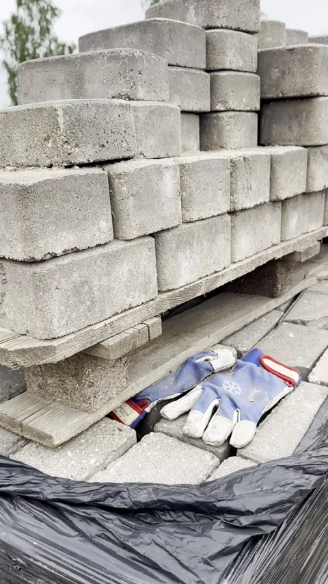 Concrete Paving Blocks Stacked on Pallet at Construction Site Stock Footage 341569217
