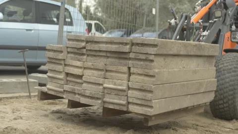 Concrete Paving Slabs on Pallet at Construction Site, Walk-In Shot Stock Footage 346882353