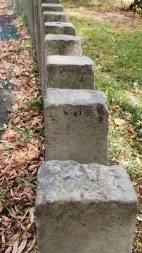 Concrete pillars lined up in a row Stock Photos