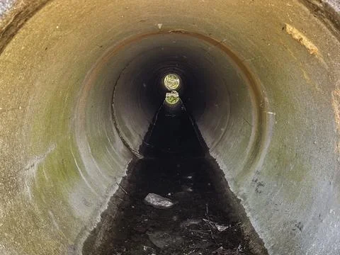 Concrete-pipe-to-bog Stock Photos