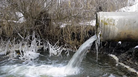 Concrete pipe transporting the polluted water Stock Footage 102262035