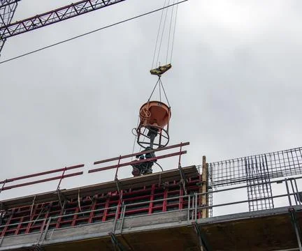 Concrete Placement Operation on Multistory Building Site Stock Photos