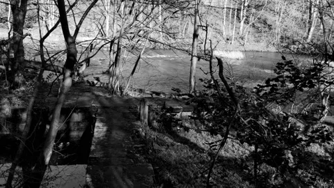 A concrete platform next to a flowing river Stock Footage 171801031