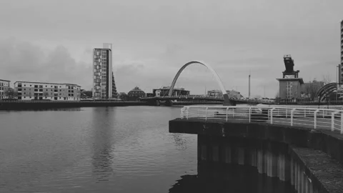 A concrete platform next to a flowing river Stock Footage 171889969