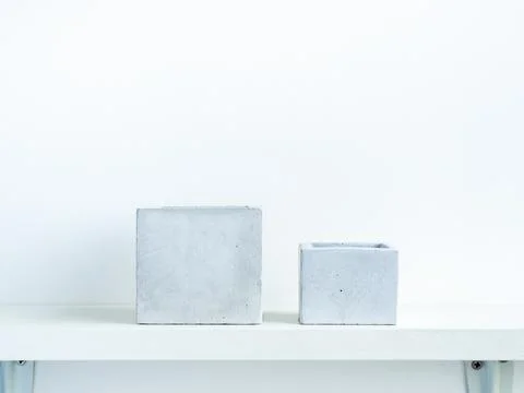 Concrete pot cubic shape or geometric cement planter for cactus and succulent Stock Photos