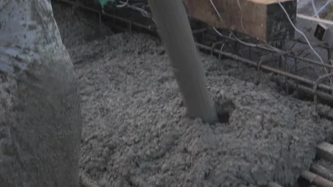 Concrete is poured into a metal structure. construction Stock Footage 280969241