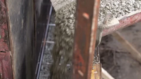 Concrete pouring process at construction site in daylight Stock Footage 340461703