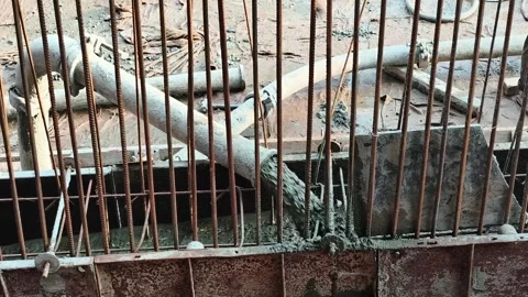Concrete Pouring Through Pipe at Construction Site Stock Footage 321284295