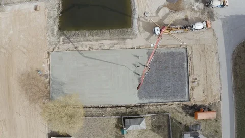 Concrete pump works on construction. Workers pour cement mortar from pump Video stock 106262654