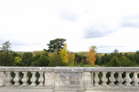 Concrete railing with tree background. 스톡 사진