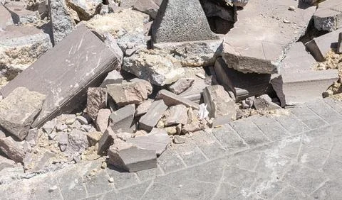 Concrete rubble and debris creating urban destruction scene Stock Photos