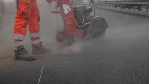 Concrete saw cuting the road Stock Footage 171463020