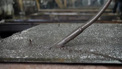 Concrete shrinkage by vibration Stock Footage 105332995