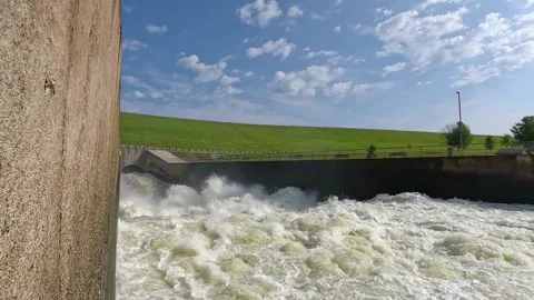 Concrete side wall for turbulent outflow of Saylorville Lake Dam in Stock Footage 287171369