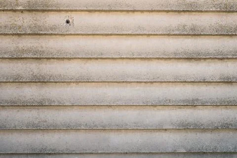 Concrete slab with horizontal line pattern. photo background loft style 스톡 사진