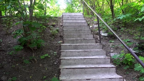 A concrete staircase in a city Park Stock Footage 76209316