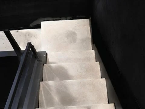 Concrete Staircase with Light Steps and Dark Metal Railing Stock Photos