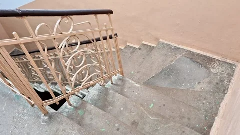 Concrete Staircase with Worn Steps and Decorative Metal Railing Video stock 331701960
