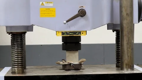 Concrete strength testing machine operating inside a laboratory. Stock Footage 109368705