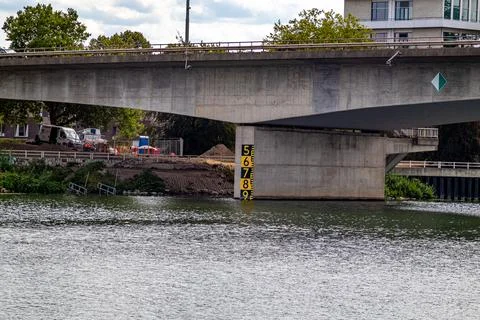 Concrete structure and pillar of bridge over navigation canal Stock Photos