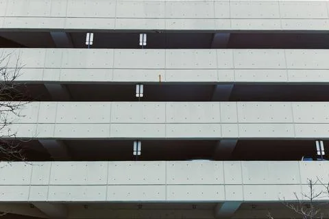Concrete structure with numbered levels and markings in a parking area duri.. 스톡 사진