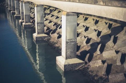 Concrete structure by the water Stock Photos