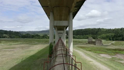 Concrete supports of the bridge, bottom view of the bridge. Stock Footage 136599576