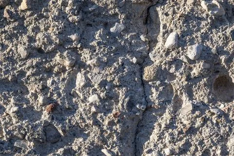 A concrete surface with a crack in it Stock-Fotos