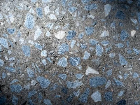 Concrete texture background with exposed aggregate stones and rough surface.. Fotos Stock