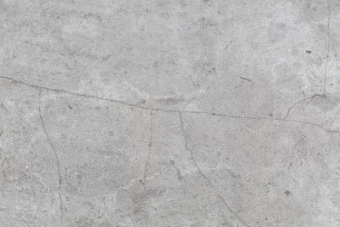 Concrete texture closeup with cracks Stock Photos