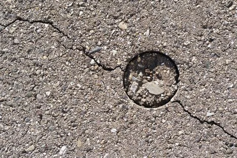 Concrete texture with crack in full screen as background. Stock Photos