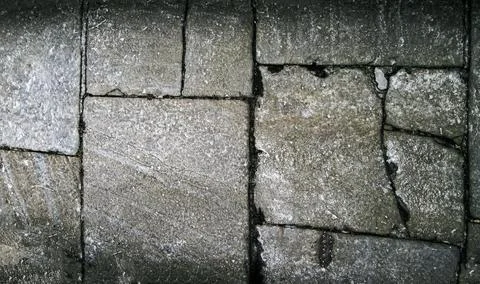 Concrete texture of tiles of different sizes. Vignetting background with rifts Stock Illustration