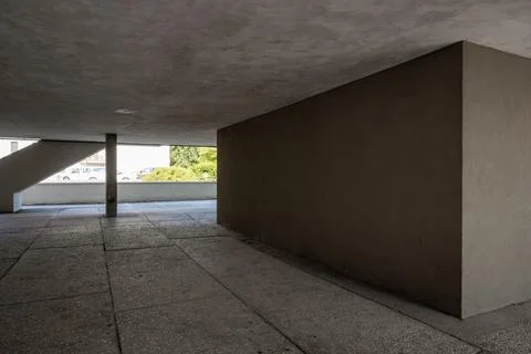 Concrete wall and geometric structure with daylight in modern architecture .. Stock Photos